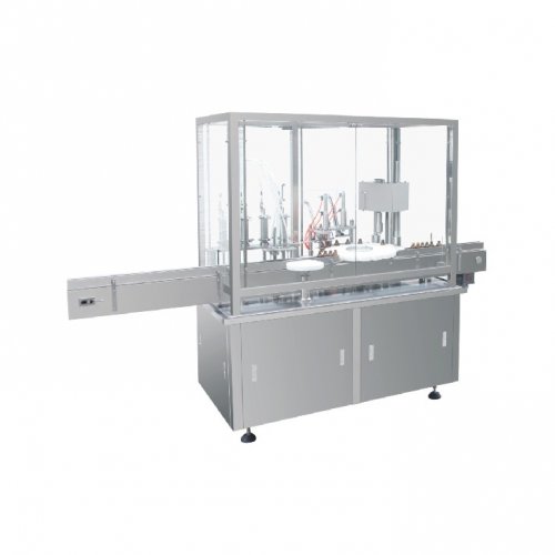 Máquina llenadora, taponadora y taponadora